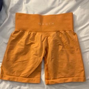 Nvgtn pro shorts in sunset orange